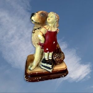 Vintage St. Bernard +little girl standing on books statue